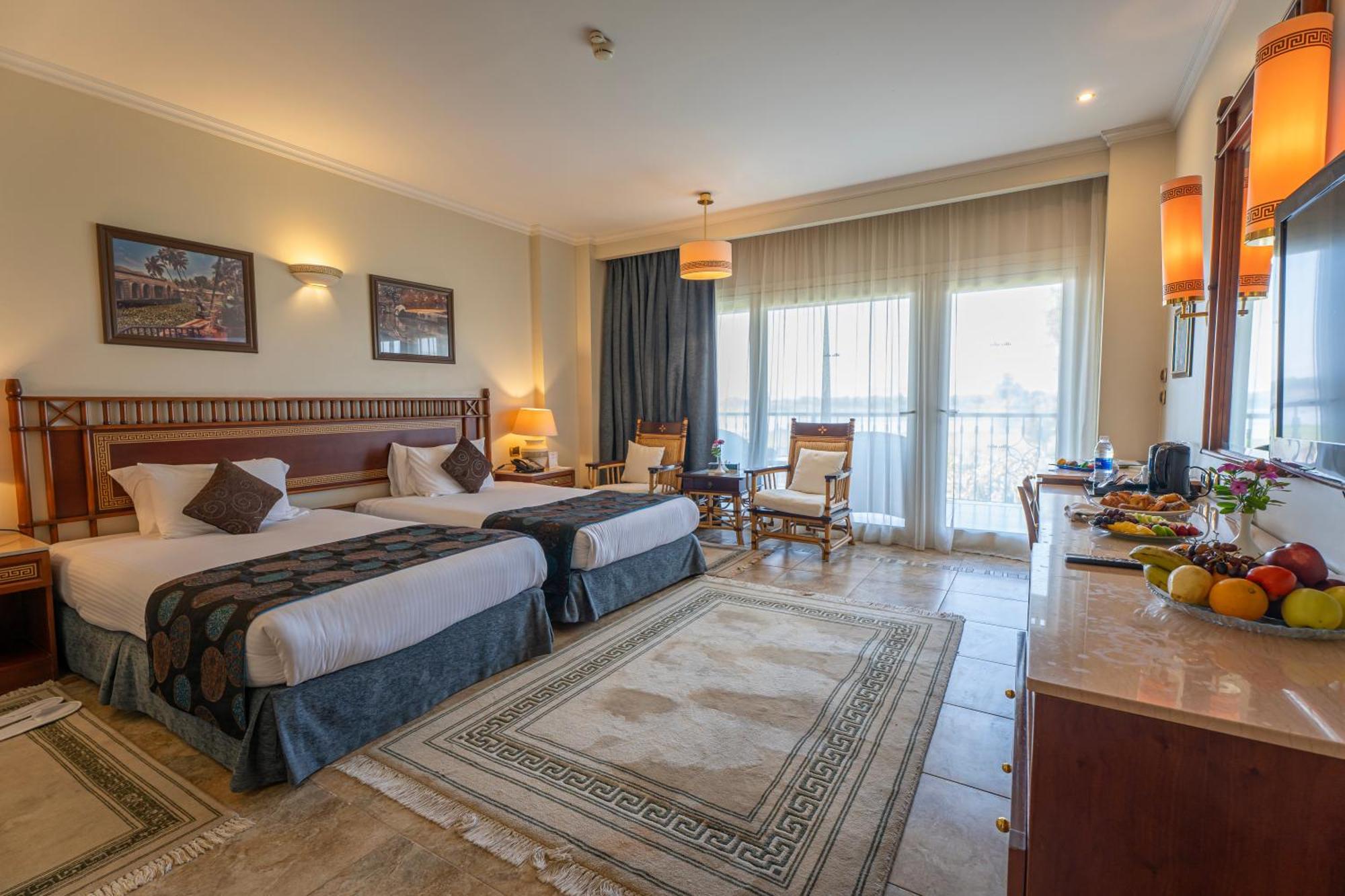 โจลี วิลล์ รีสอร์ต แอนด์ สปา คิงส์ ไอส์แลนด์ ลูเซอร์ Hotel ลักซอร์ ภายนอก รูปภาพ A room at the hotel