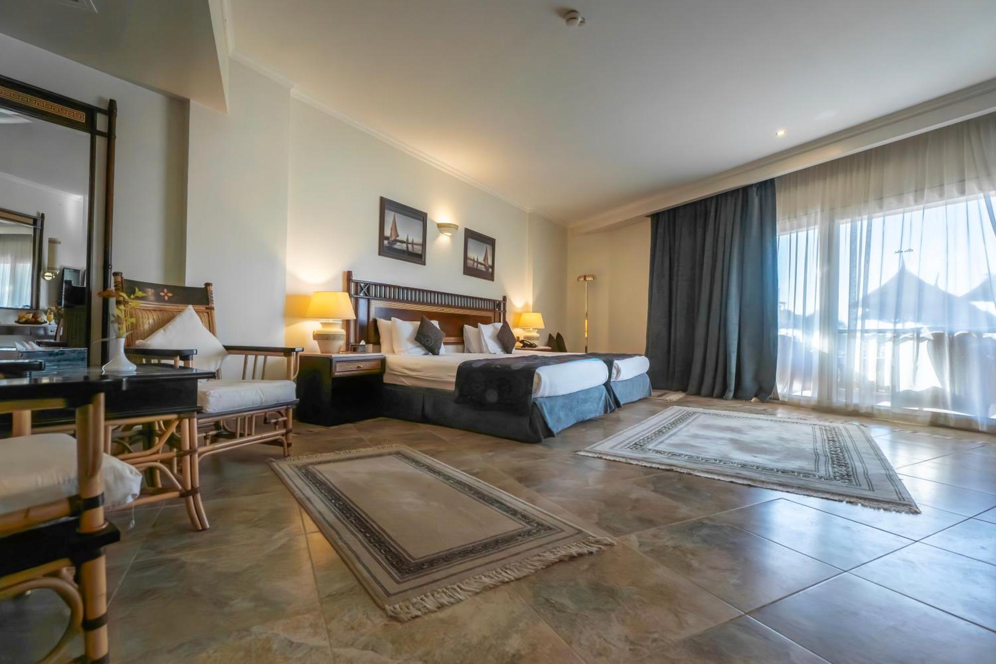 โจลี วิลล์ รีสอร์ต แอนด์ สปา คิงส์ ไอส์แลนด์ ลูเซอร์ Hotel ลักซอร์ ภายนอก รูปภาพ A room at the hotel